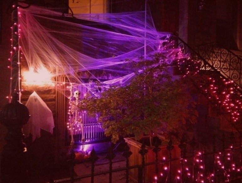 halloween house with webs and ghosts