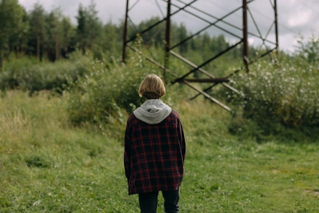 A person standing alone in nature.