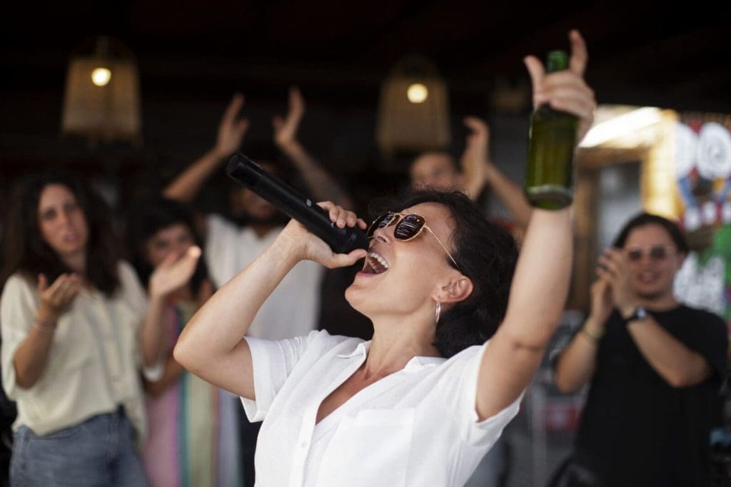 adults having fun and singing