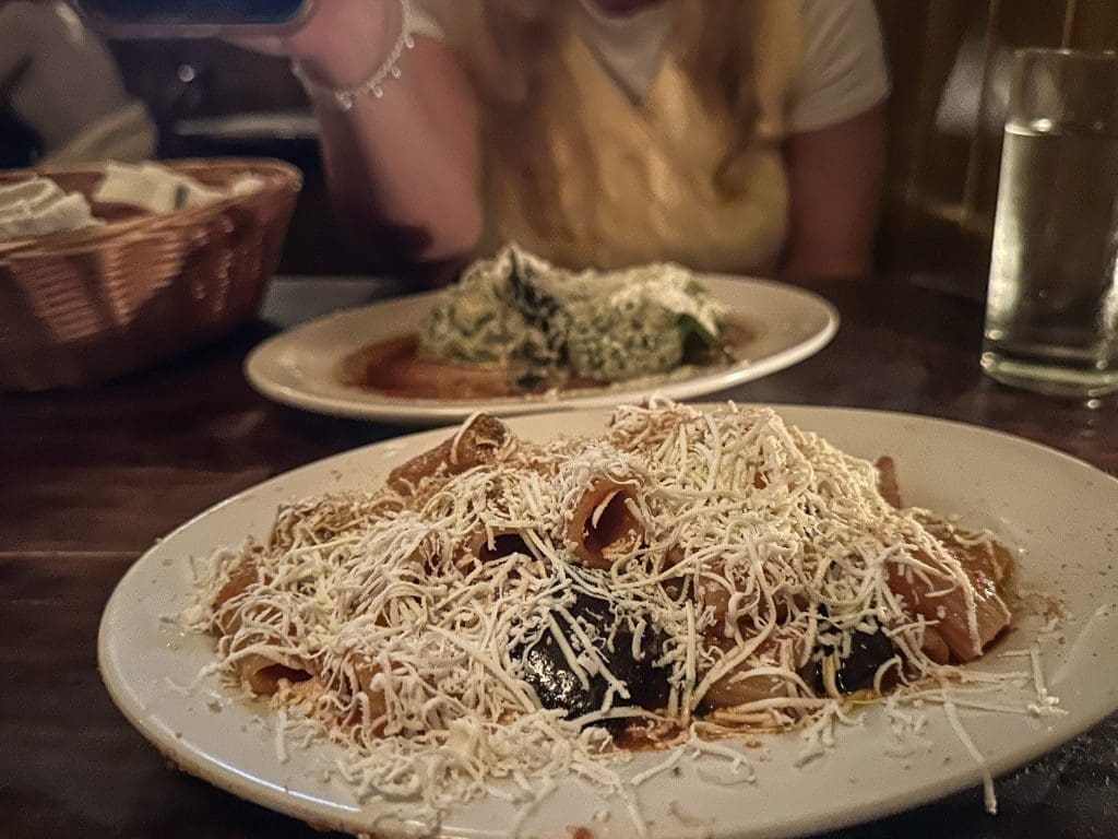 Rigatoni alla Disgraziata covered with grated ricotta salata