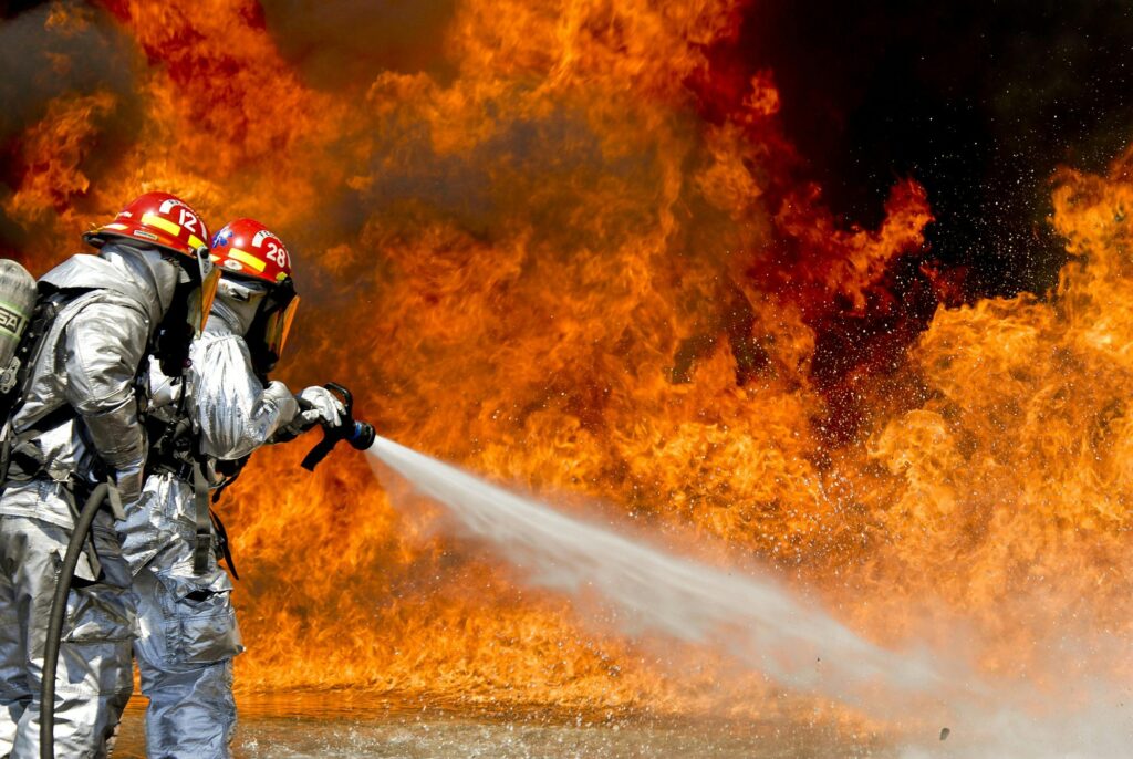 firefighters extinguishing fire