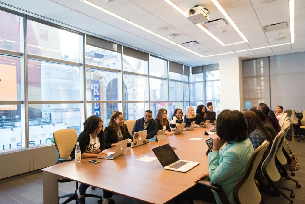 group of people sitting around a table