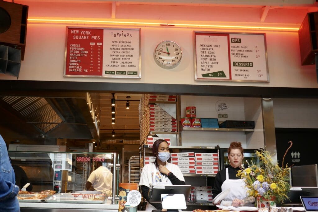 The Corner Slice menu above the front counter