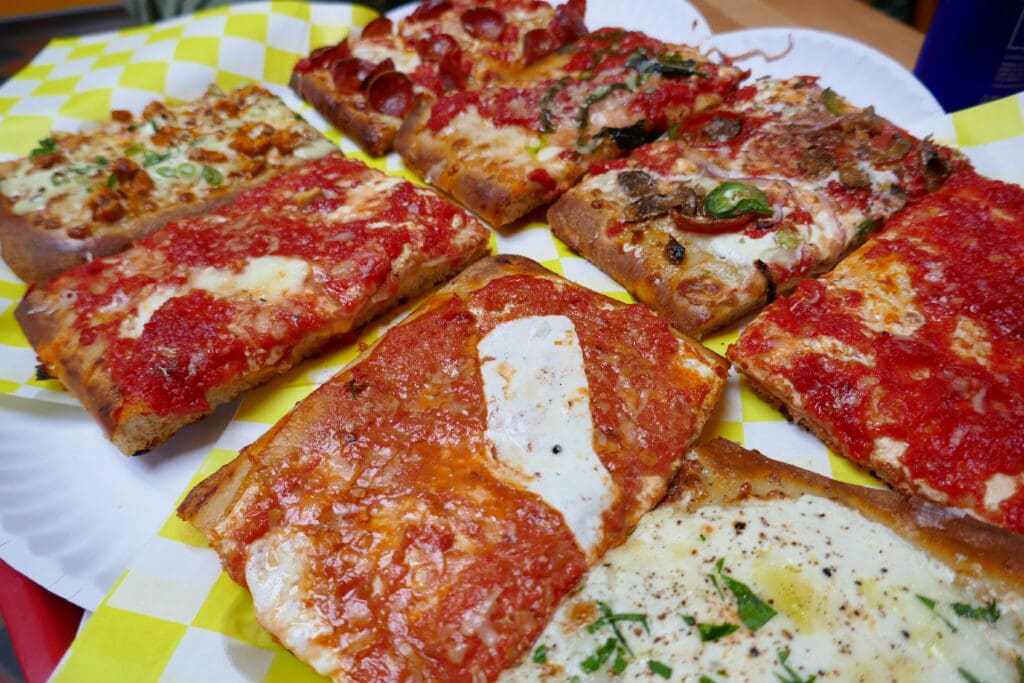 Vodka slice front and center amongst a spread of slices