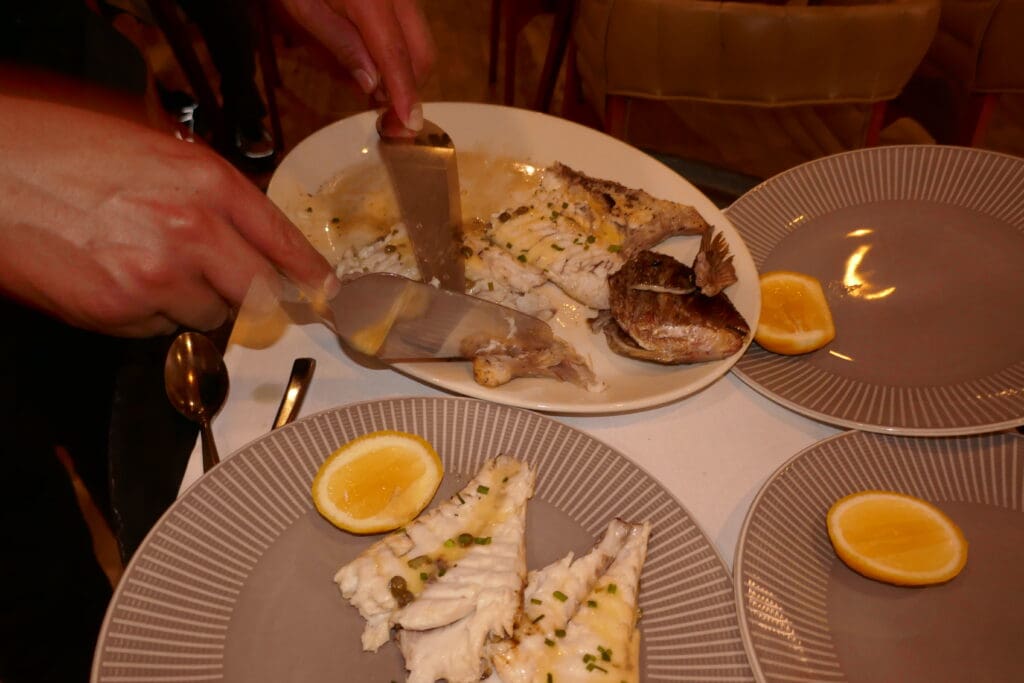 Whole fish, carved tableside by a server