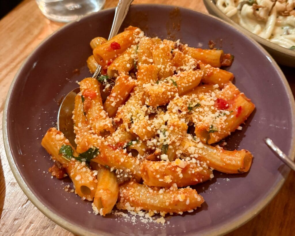 Rigatoni with tomato, pancetta, chili, mint and basil