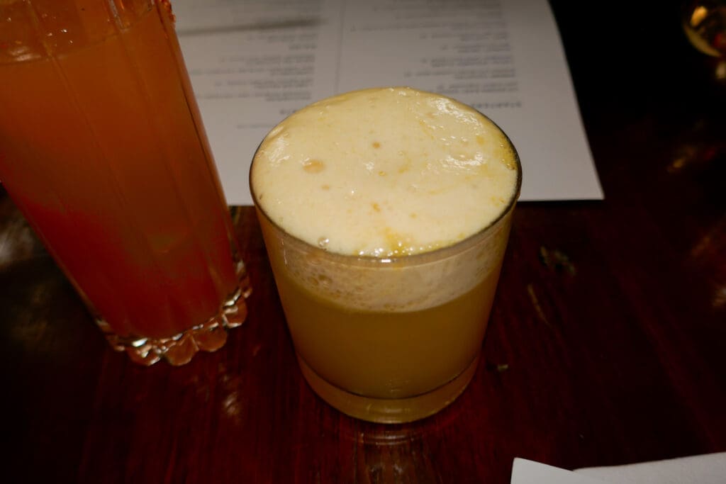 The creamy, dreamy Pollen Puff drinks like the best Bee's Knees you've ever tasted
