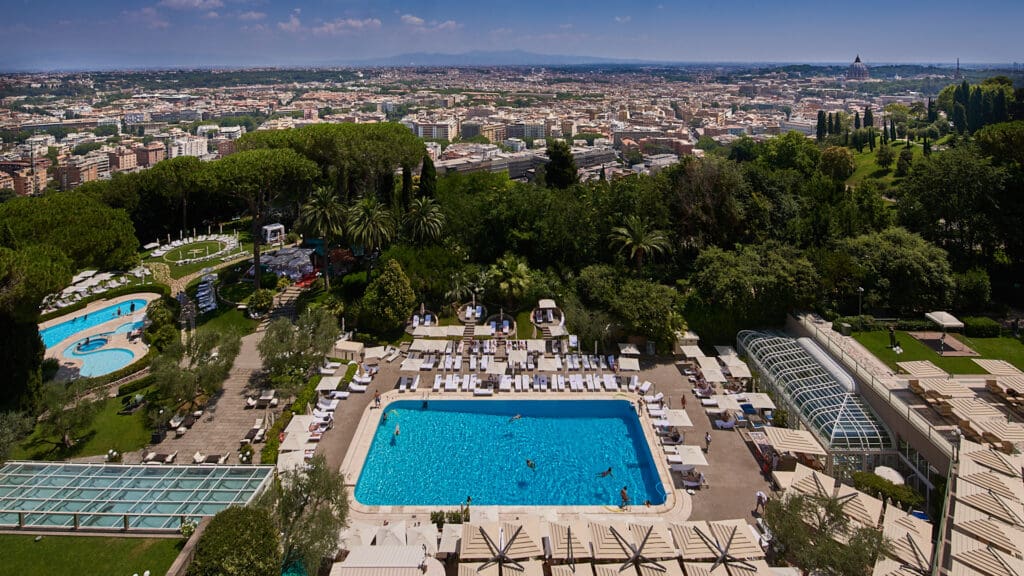 Rome Cavalieri outdoor pool area, rome in the distance