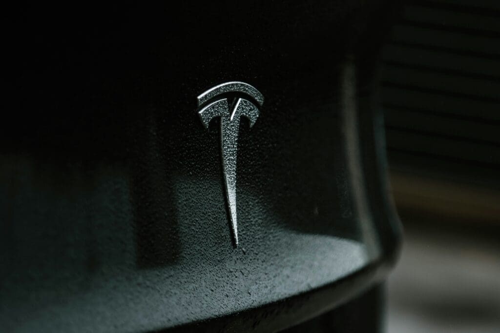 Tesla logo on the back of a car