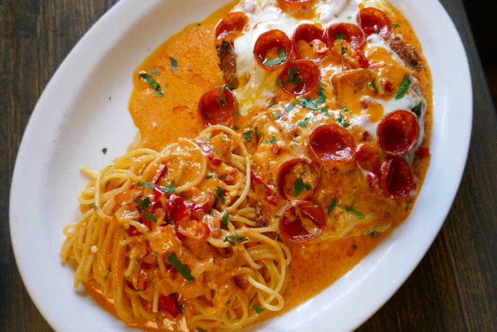 Crispy chicken cutlet, doused in vodka sauce and topped with crisp pepperoni cups