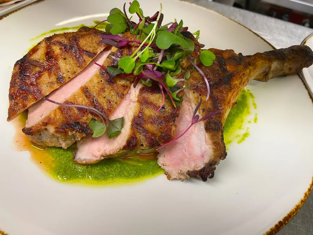 a grilled pork chop at Grana BYOB in Cape May, NJ