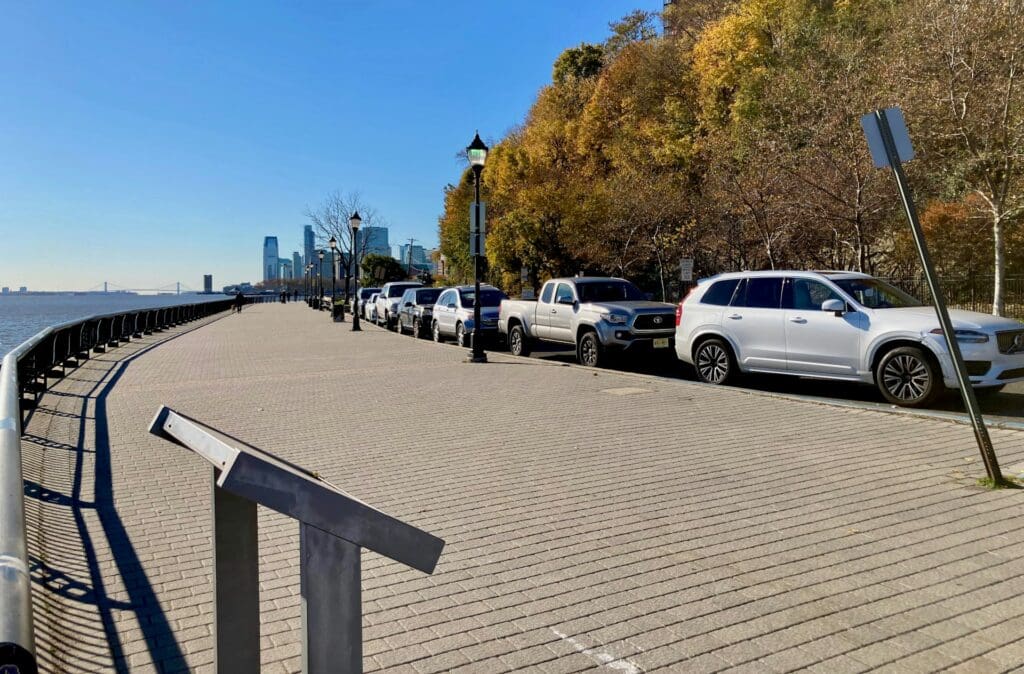 Cars parked along Hoboken as the city announces a new transportation director to improve parking and traffic.