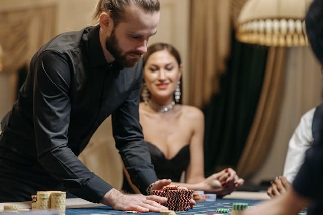 poker player handling chips