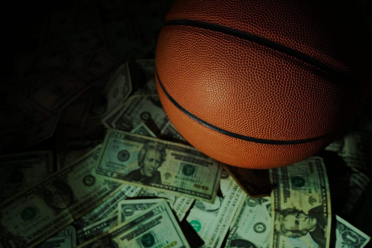 a basketball on a pile of money - FBI officials announce arrests in Mafia-linked NBA betting and gambling probe