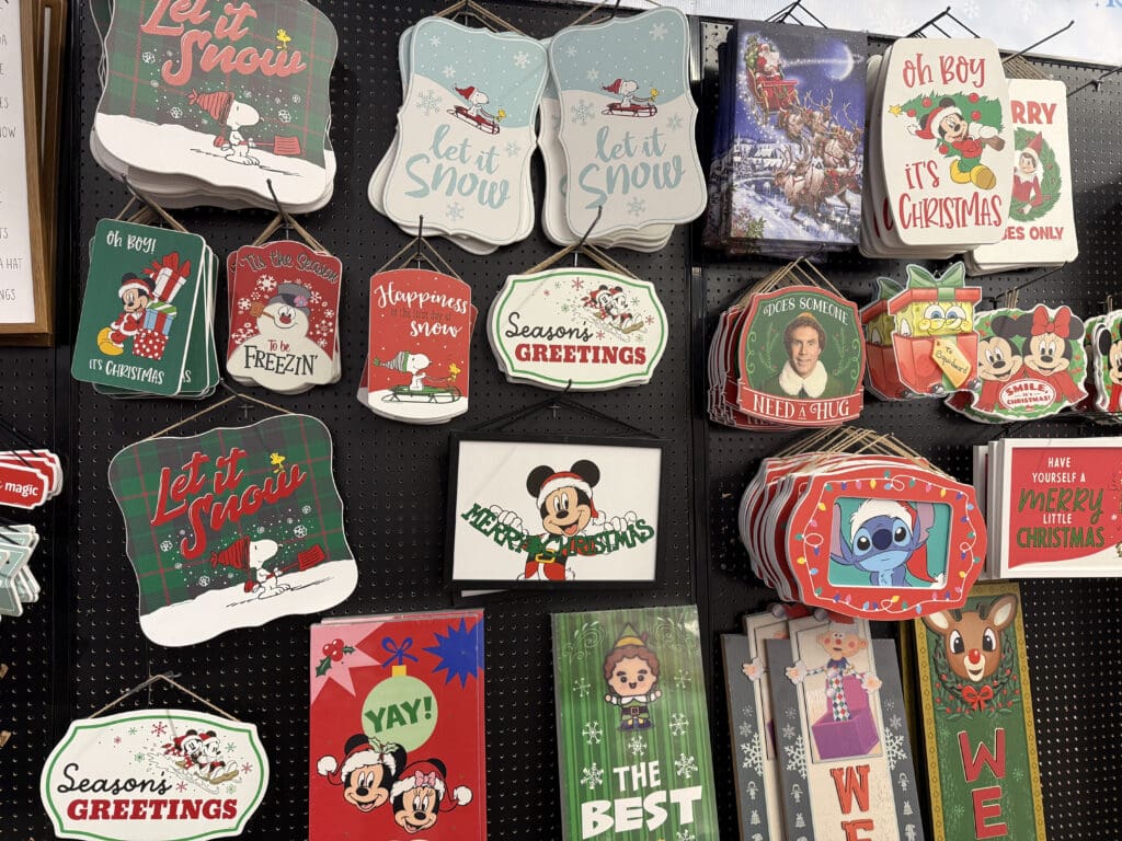 wall signs and porch signs with Snoopy, Mickey and Minnie, Stitch, and a bunch of other popular characters