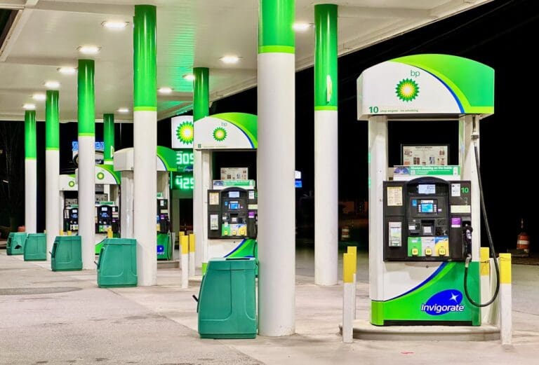 Modern BP gas station in the United States with pumps and a green canopy visible