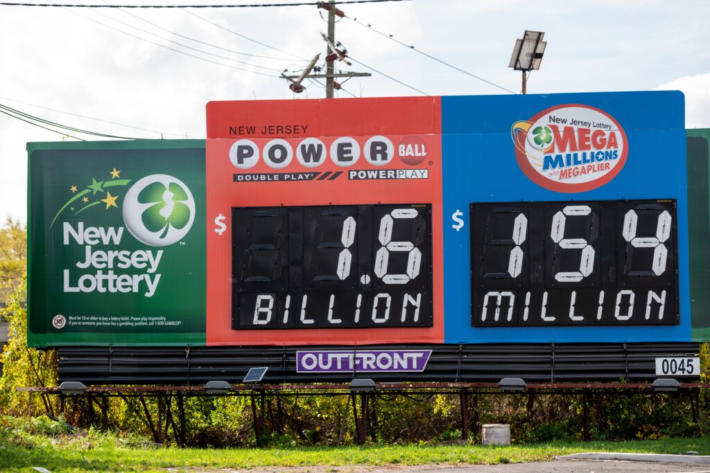 Powerball lottery, New Jersey Lottery logo on billboard, expiring prizes
