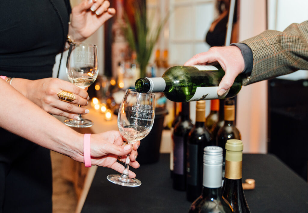 pouring wine tastings at New Jersey Wine & Food Festival