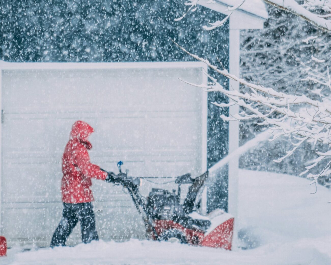man uses snow blower in New Jersey blizzard