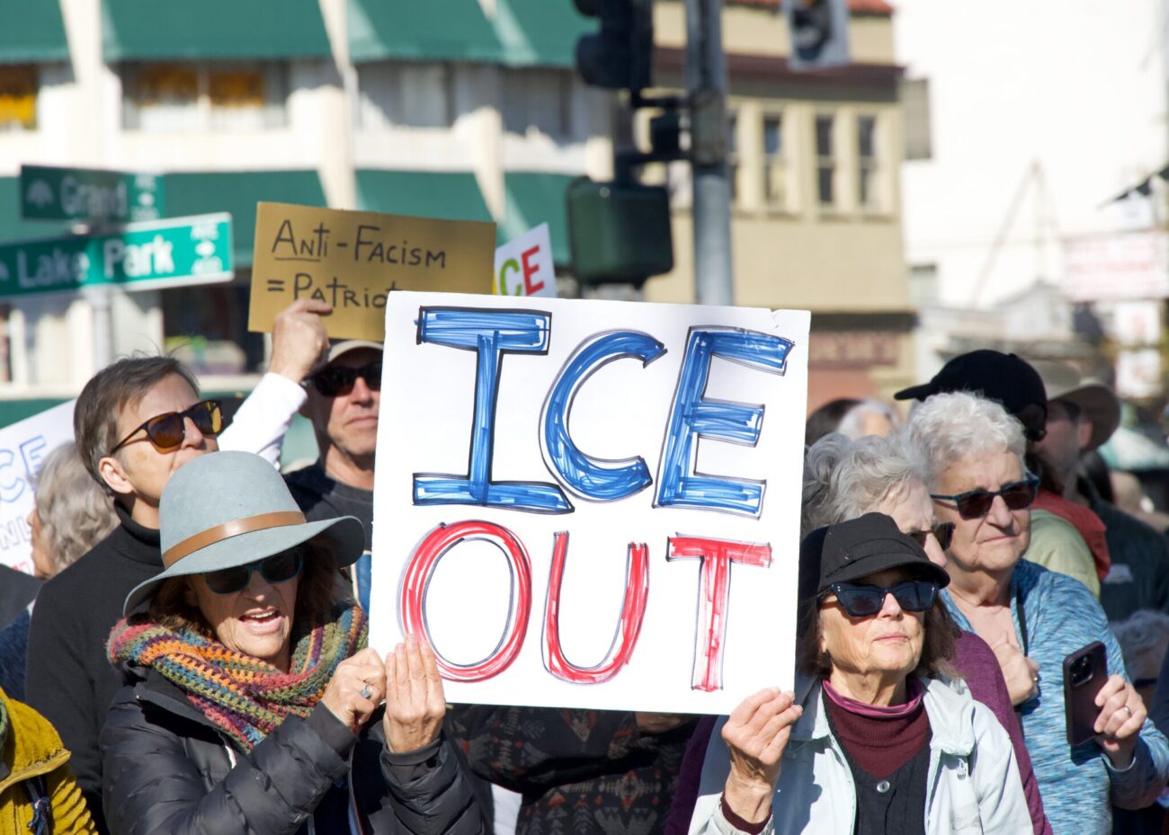 "ICE OUT" on protestor signs