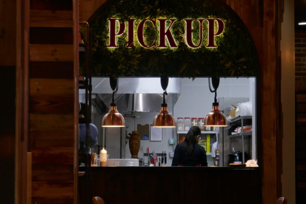 The pickup window, a pork-filled trompo slowly turns in the background