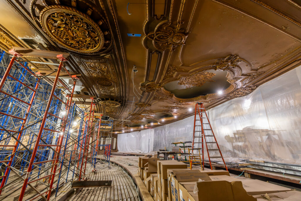 Loew's Jersey Theatre construction progress shows ornate ceiling and design