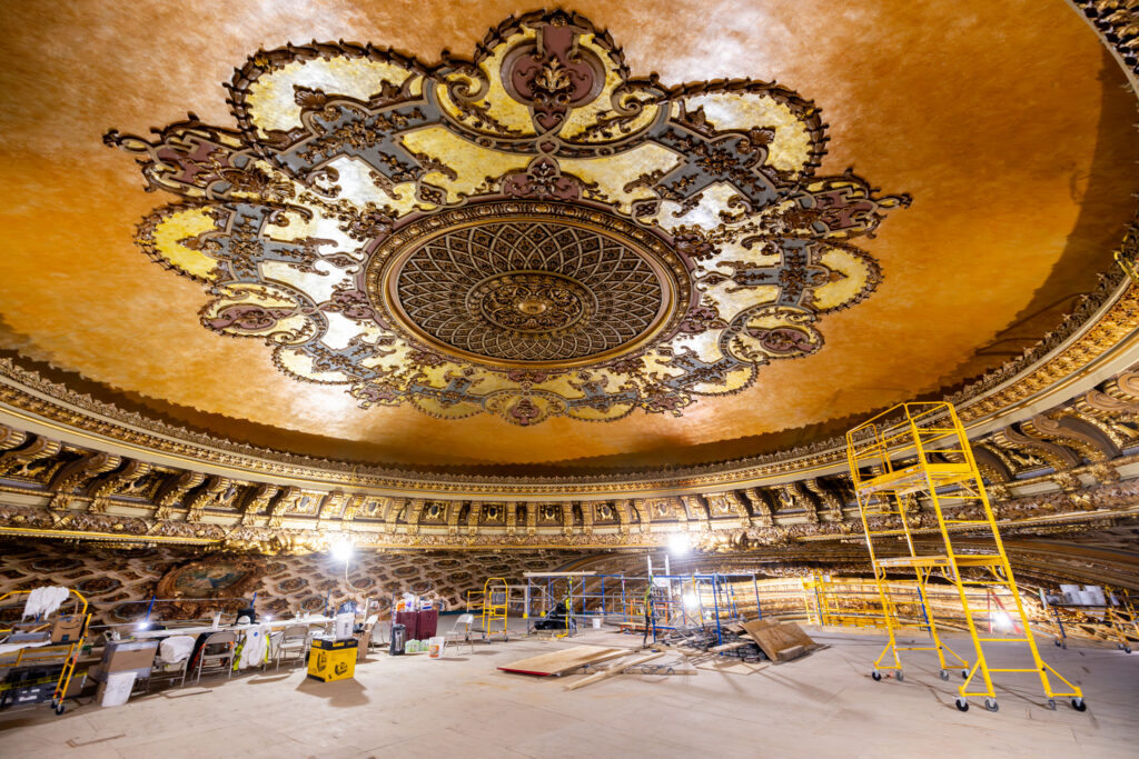 Loew's theatre construction progress shows a massive ornate design on the ceiling