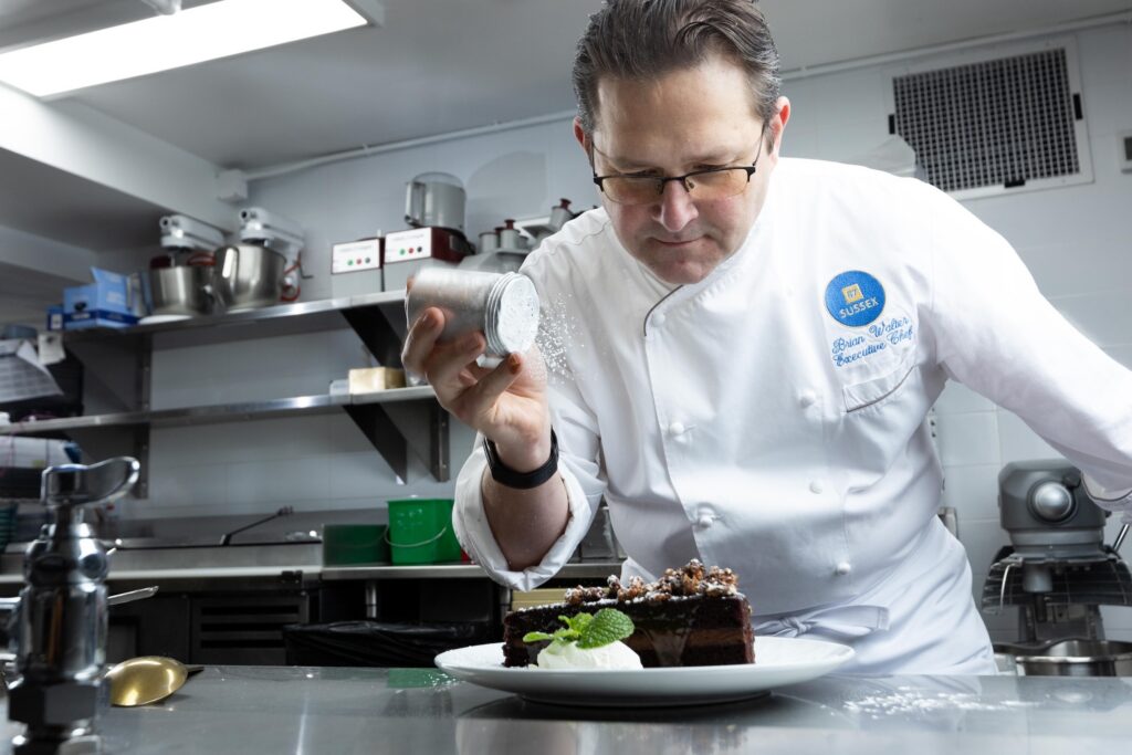 Chef Brian Walter of 87 Sussex prepares a dish for the Groth Vineyards wine pairing dinner
