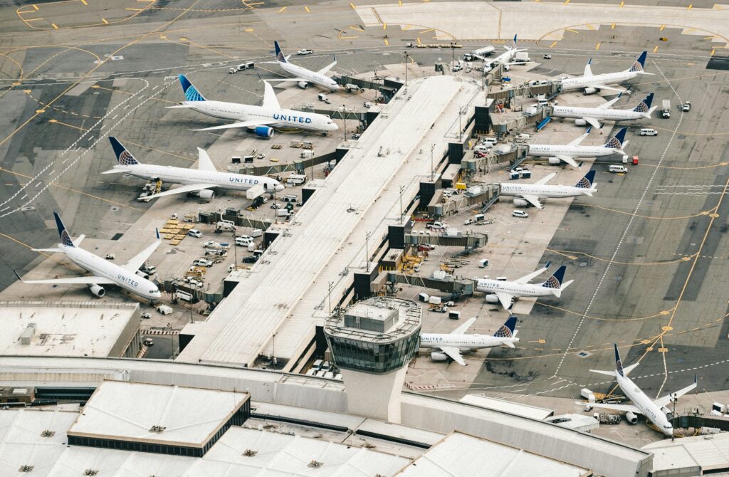 Newark Airport gates with United Airlines aircraft docked during normal operations, illustrating scale of operations affected by Monday's ground stop and air traffic control tower evacuation