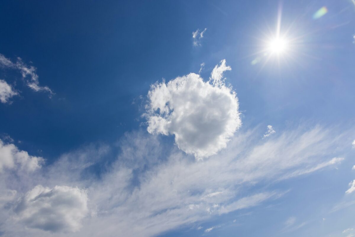 Bright spring sunshine and puffy white clouds in clear blue sky as New Jersey prepares for warm weather and thunderstorm potential this week