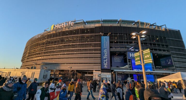 Fans walking toward MetLife Stadium in New Jersey, where World Cup matches will draw 80,000 people per game with no general parking available.