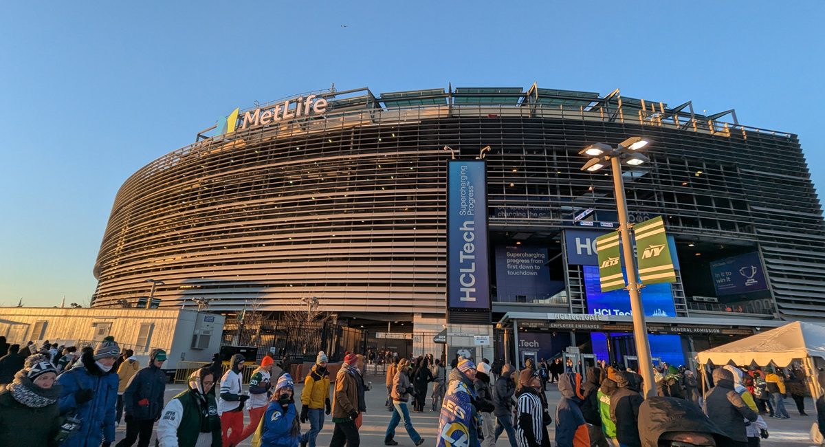 Fans walking toward MetLife Stadium in New Jersey, where World Cup matches will draw 80,000 people per game with no general parking available.