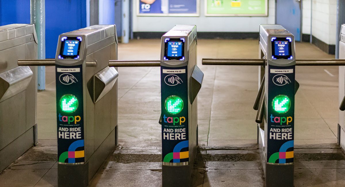 PATH train TAPP contactless fare turnstiles at Hoboken station in New Jersey, showing the existing gates slated for replacement under the Port Authority's new fare gate upgrade plan