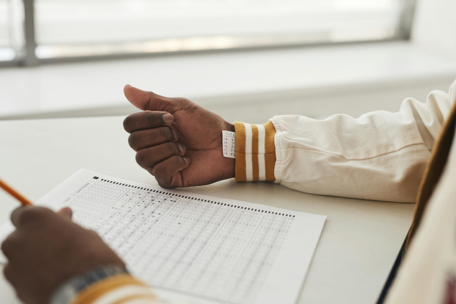 New Jersey student taking state exam with pencil, essays will soon be graded by AI