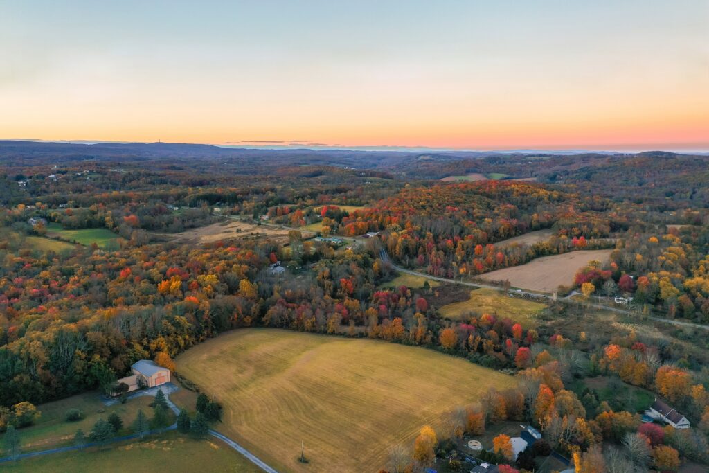 Aerial view of rural New Jersey farmland at sunset, highlighting open land at the center of growing concerns over proposed AI data center development