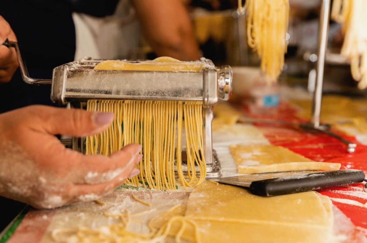 hand-made pasta being cut