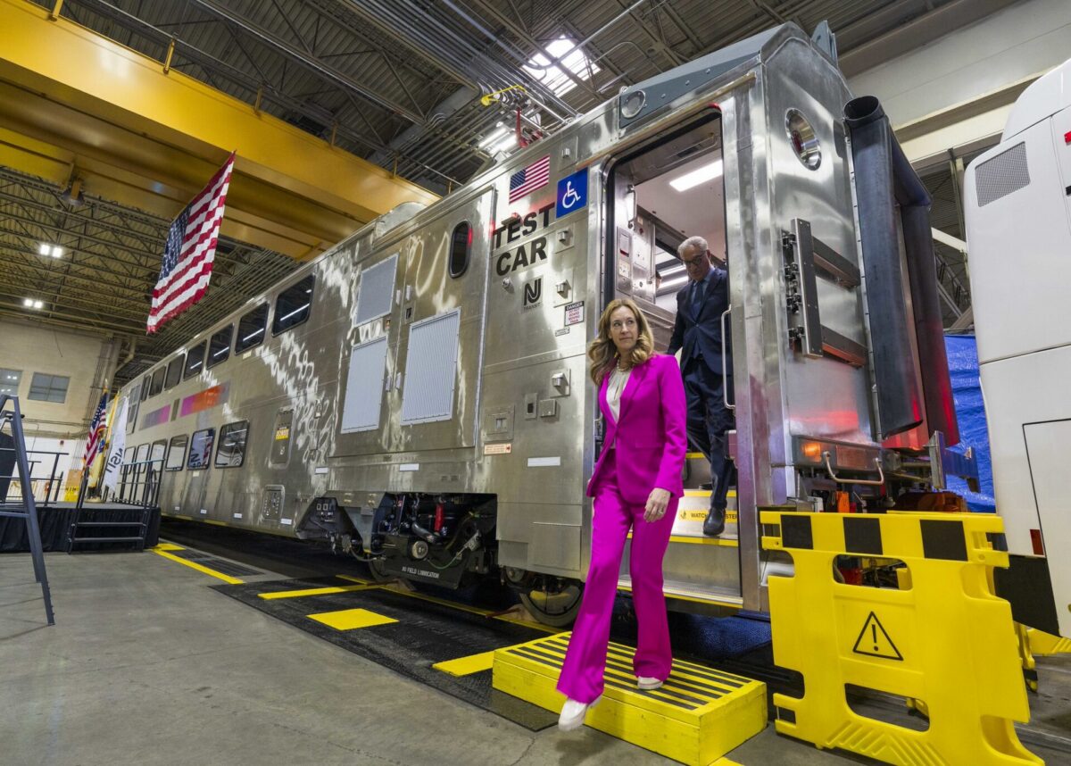 Governor Mikie Sherrill stepping off the new NJ Transit Multilevel III rail car at the Kearny maintenance complex
