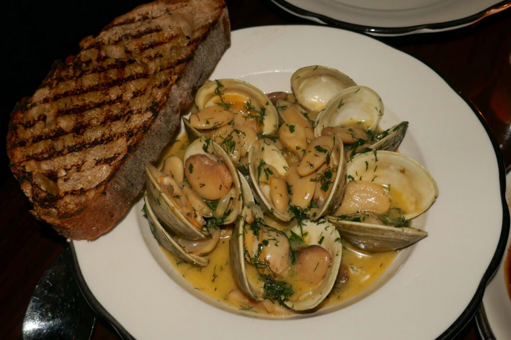 a bowl of clams and butter beans at grand tavern