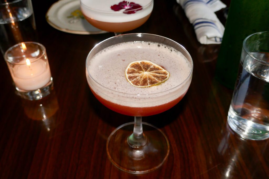 bright red millionaire cocktail sloe gin, rum, lime, apricot