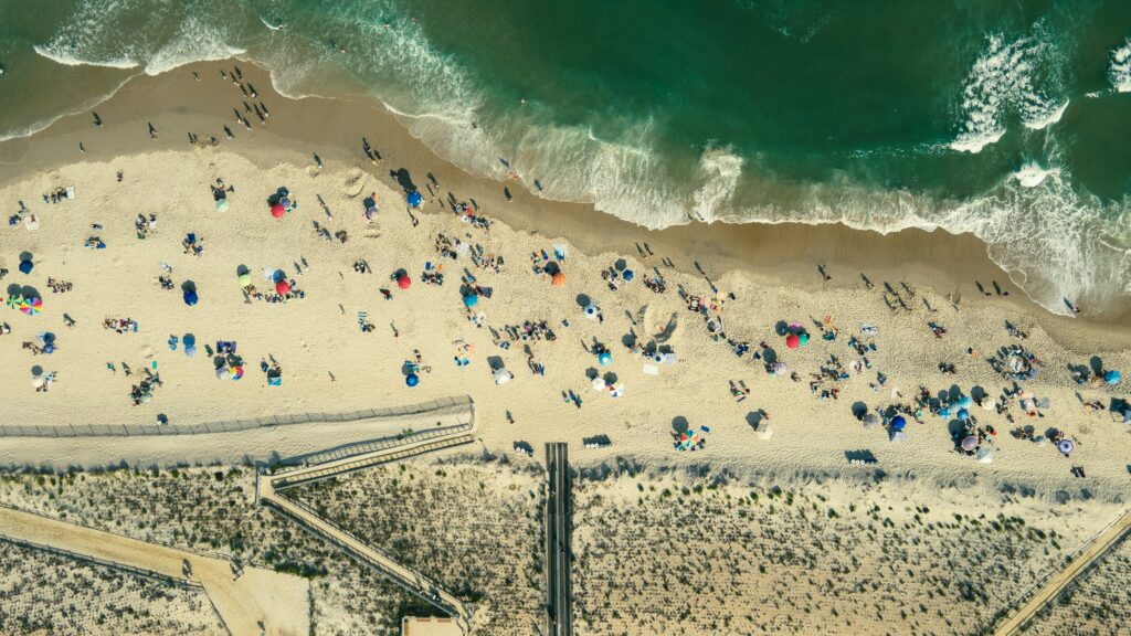 Aerial view of a crowded New Jersey beach on a sunny summer day