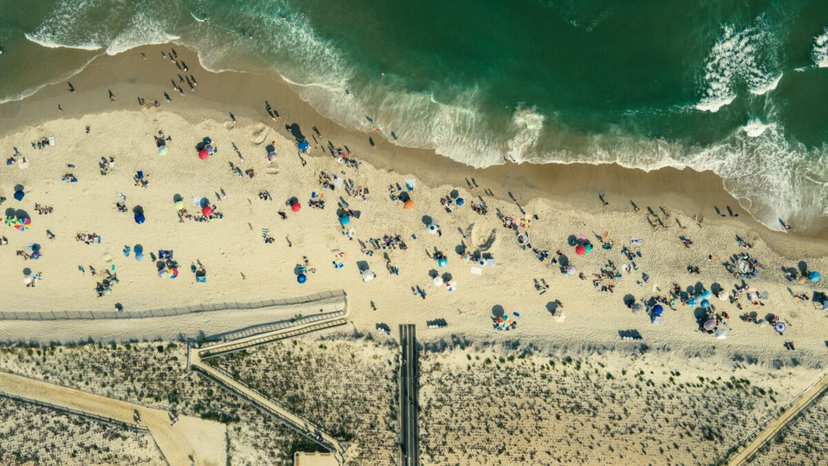 Aerial view of a crowded New Jersey beach on a sunny summer day