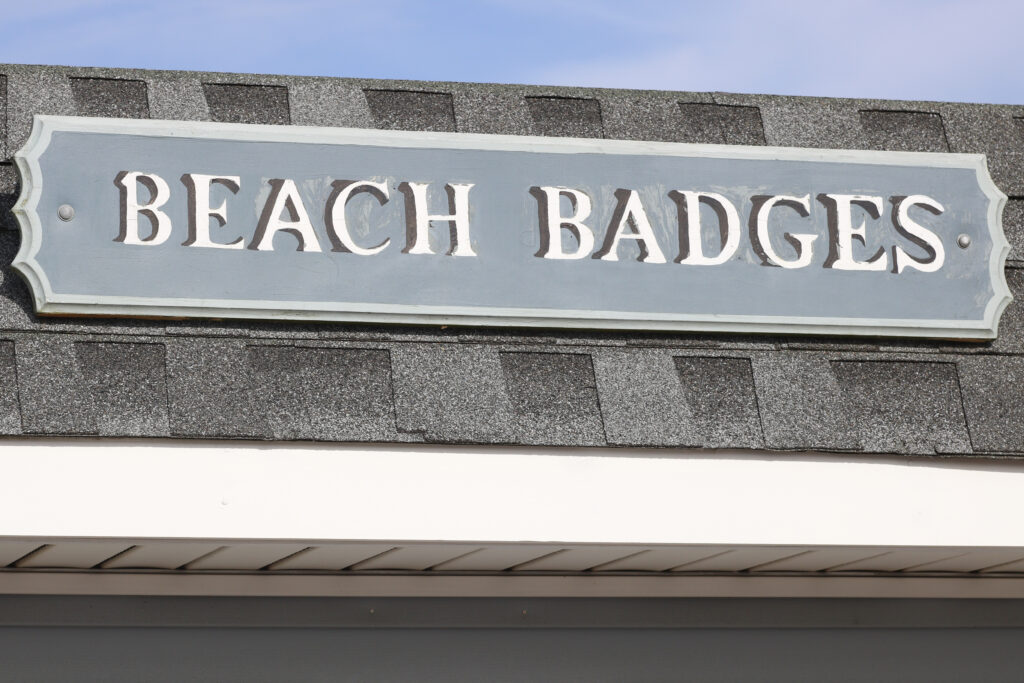 A Beach Badges sign at a New Jersey Jersey Shore beach