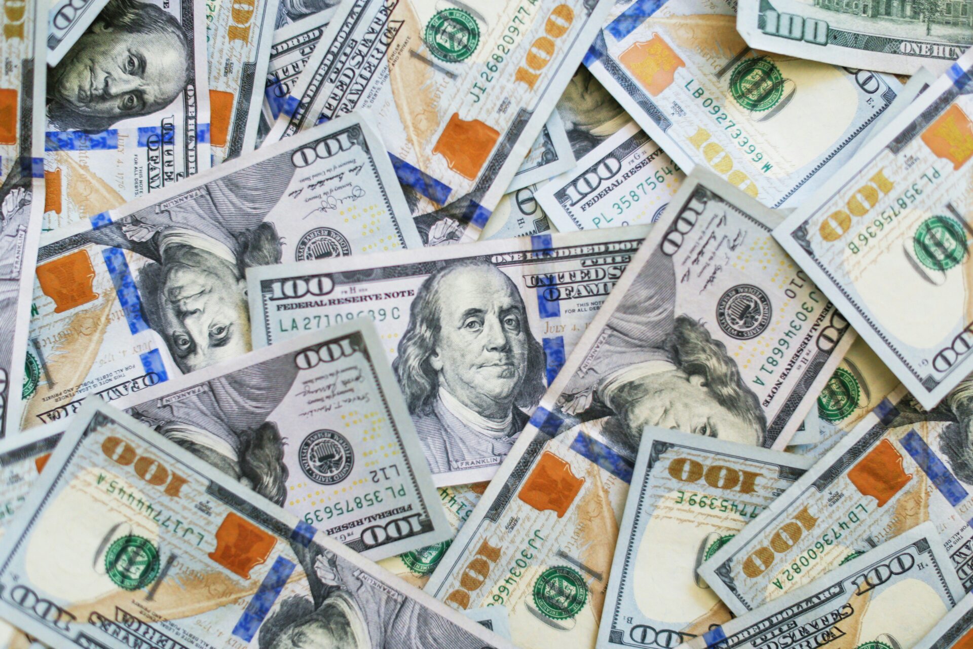 A pile of $100 bills representing the unclaimed $5.9 million New Jersey lottery jackpot