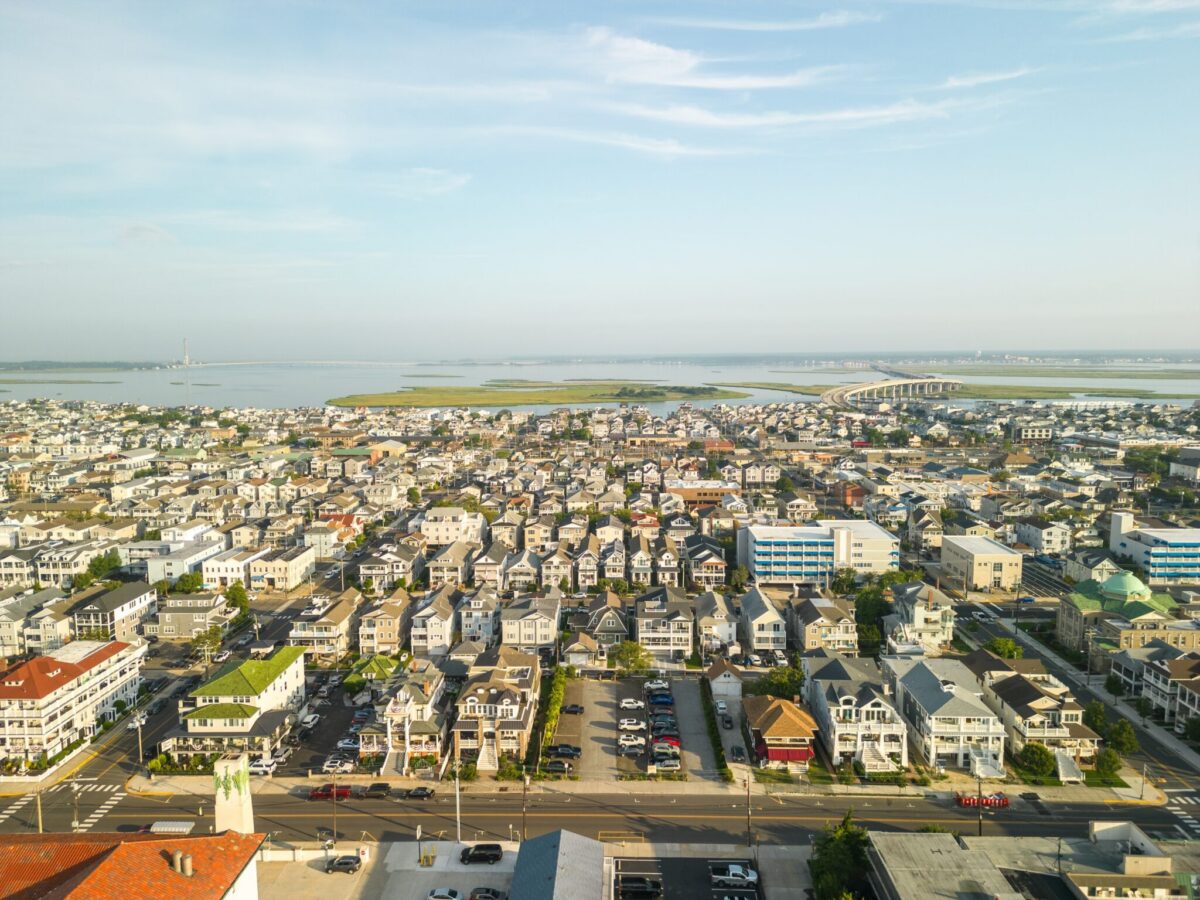Aerial view of Ocean City, New Jersey in summer showing the island town between the bay and the Atlantic Ocean