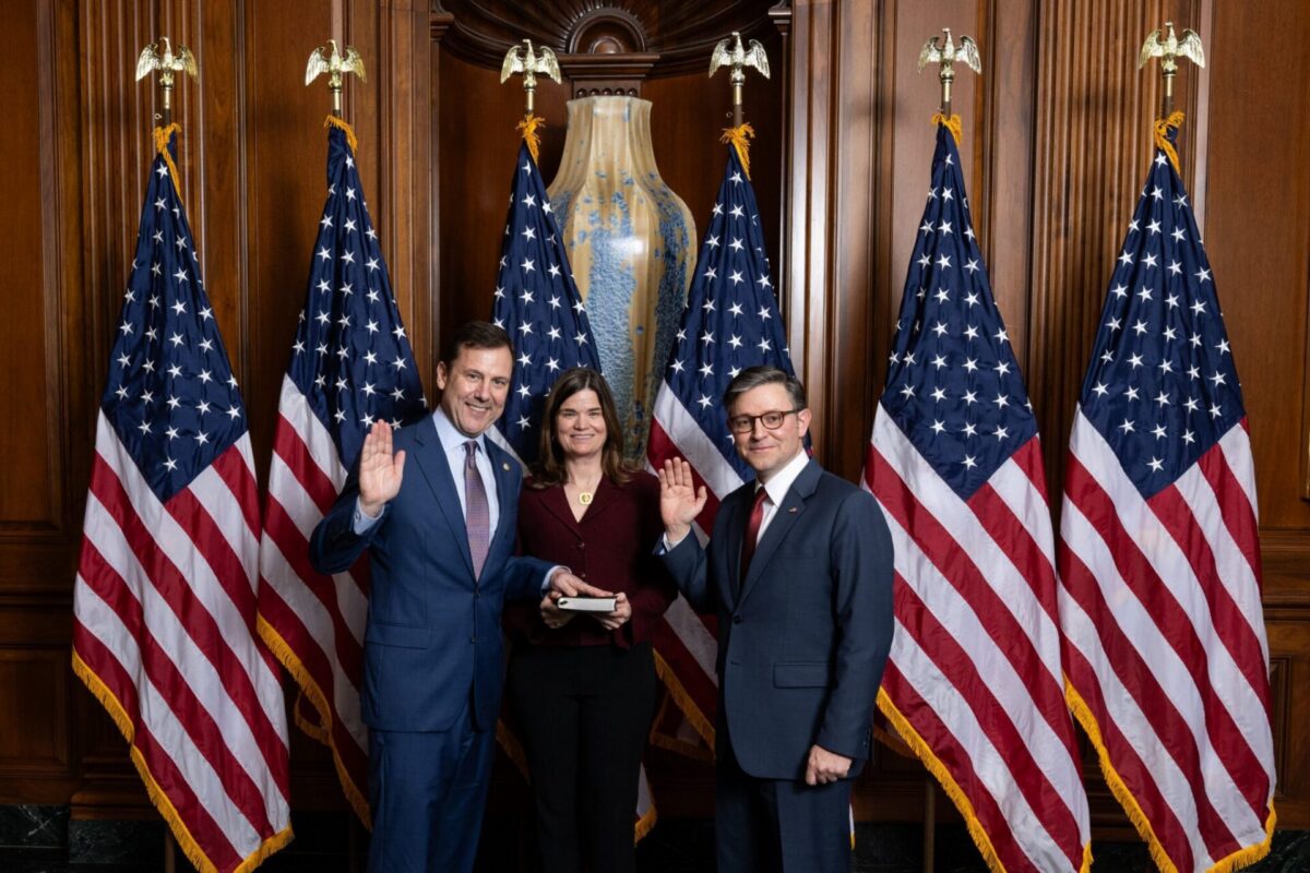 Rep. Tom Kean Jr. being sworn into the 119th Congress alongside Speaker Mike Johnson