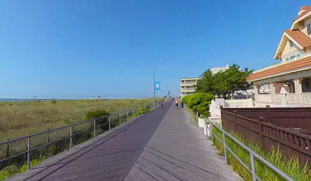 Ventnor City boardwalk stretching along the Jersey Shore on a sunny summer day