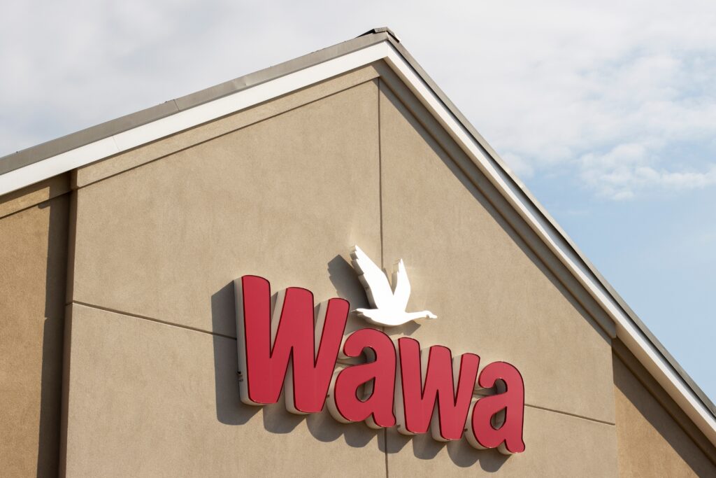 Wawa convenience store sign on a store exterior