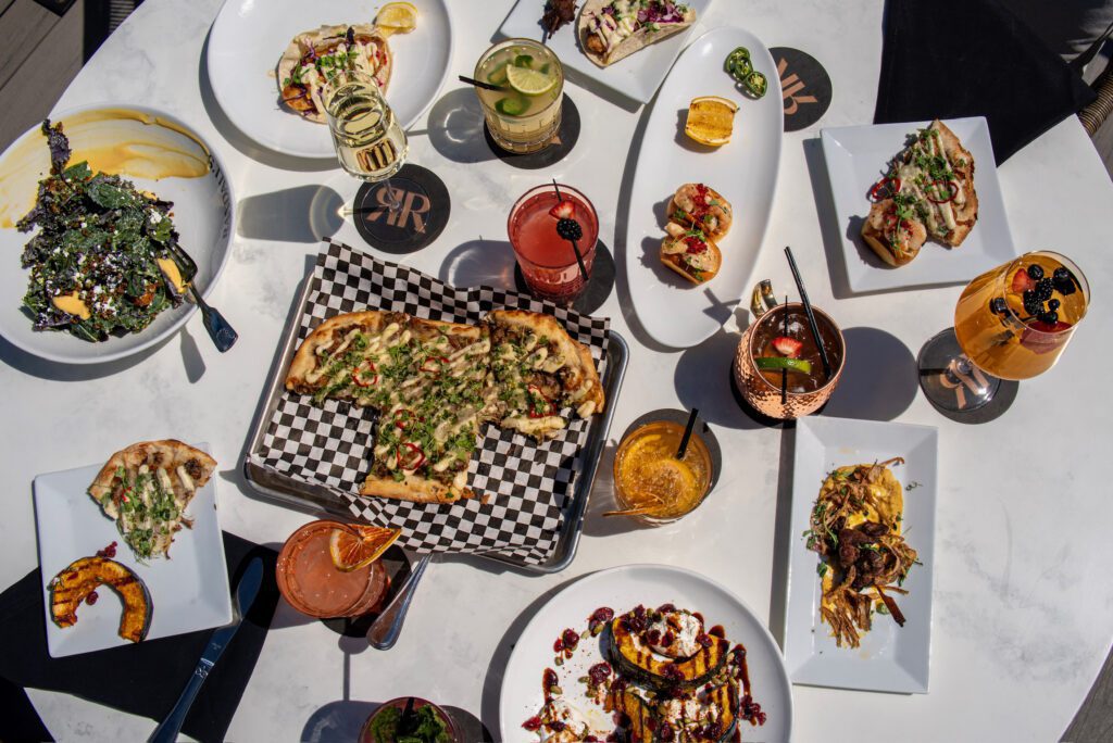 A full spread of food on the patio at Randall's Restaurant