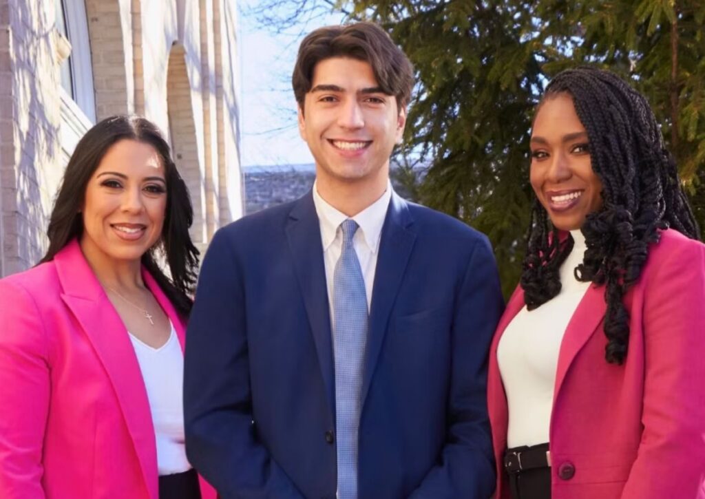 Vélez flanked by council running mates Michelle Rodríguez and Danyale Wells.