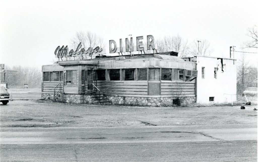 a black and white photo of Malaga Diner